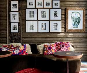 cozy seating area with artwork on the walls
